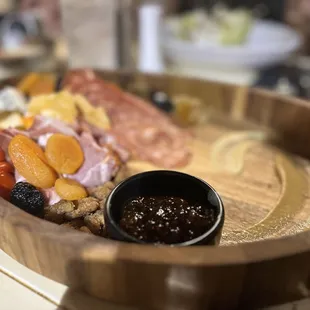 a platter of meat and vegetables