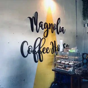 a surfboard leaning against a wall