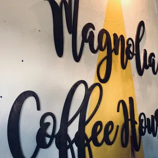 a banana leaning against a wall