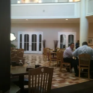 two men sitting at a table