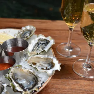 "Bubbles and Pearls"    (*Monday special: $1 oysters and $5 glasses of champagne)