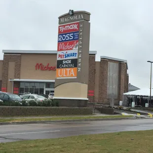 The Grand Opening Ceremony with Mayor Mitch in the tent. It's raining, it's pouring, the old man is....