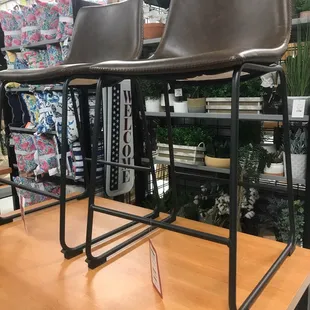 Faux leather and iron Bar stools $60 each! Not a bad price.