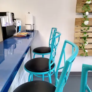 Cute Turquoise barstools.