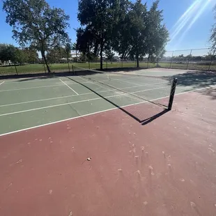 Tennis court facing the park