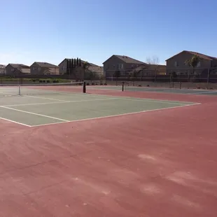 2 tennis courts. No lights, boo