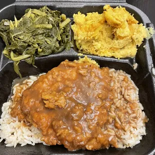 Smothered Porkchop with rice &amp; gravy, turnips and squash casserole.