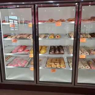 a display case full of donuts