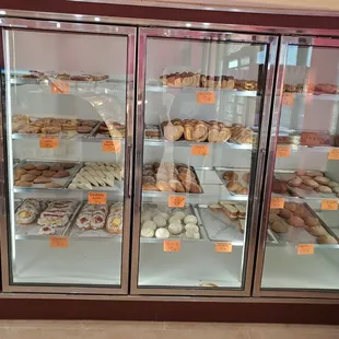 a display case full of pastries