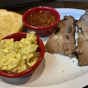 Brisket plate with baked beans and tater salad.