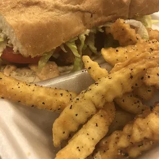 Shrimp Po Boy with Remoulade sauce and a side of fries