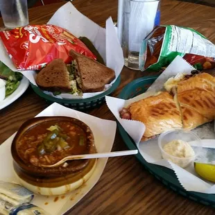 French dip, turkey on pumpernickel, side salad, and Magoon&apos;s famous chili.