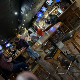 a group of people sitting at a table