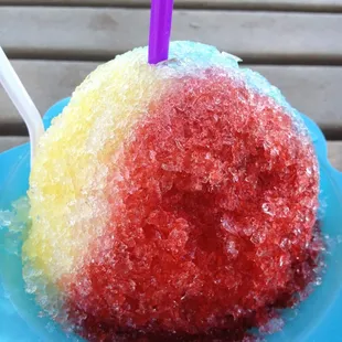 Rainbow ice; blue coconut, strawberry, and pineapple