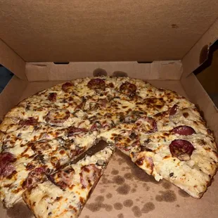 Beef pepperoni, and mushroom hand tossed pizza w garlic sauce!!!