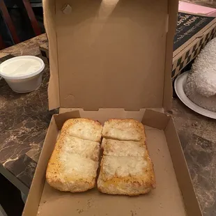 French bread/dinner roll is the cheese garlic bread