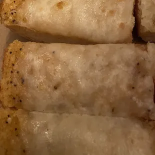 Small dinner roll is the $6 "garlic cheese bread" that had almost no cheese
