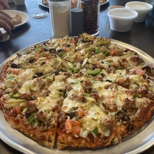 One of the BEST Veggie pizzas in town. This one is Half Veggie &amp; Half Veggie w/sausage