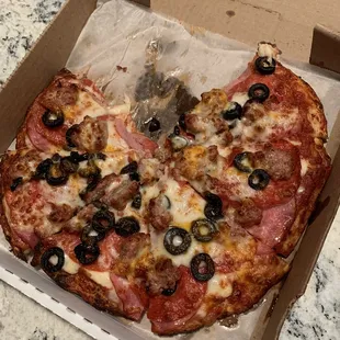 Regular sauce, pepperoni, Canadian bacon, black olives