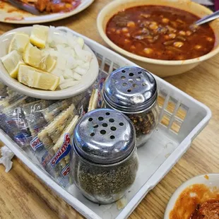 a table of food and condiments