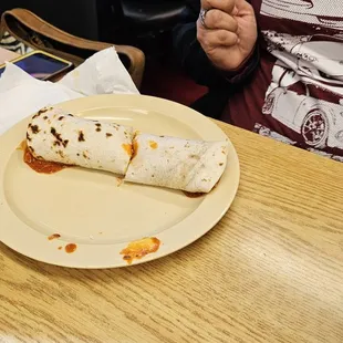 a burrito on a plate