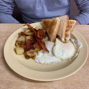 Eggs, potato, bacon, and toast