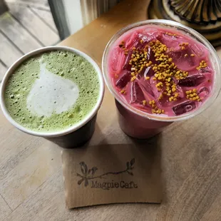 two smoothie drinks on a wooden table