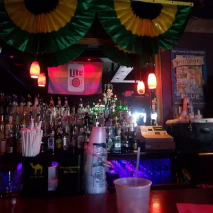 a drink in a plastic cup at a bar