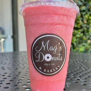 a smoothie in a plastic cup