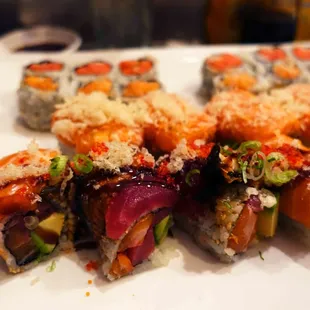 Spicy Crunchy Salmon Roll, Crunchy Tuna &amp; Salmon, and Tiger Roll (tuna, salmon, avocado inside with tuna, salmon, eel)