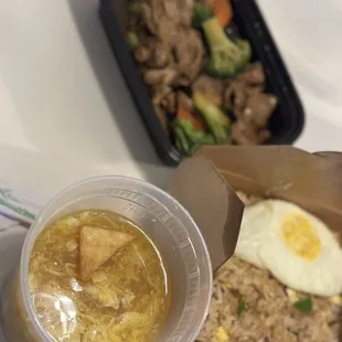 Egg Drop Soup (Bowl), Hot and Sour Soup* (Bowl) (not shown), BBQ Pork Egg Fried Rice with BBQ pork, and Beef Stir Fried and Broccoli