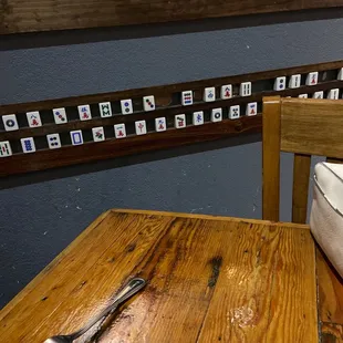 a wooden table with utensils on it