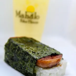Musubi - Spam, furikake, eel sauce, and white rice wrapped in nori
