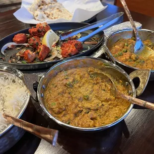 Chicken tikka, eggplant Bharta, mutter paneer. and naan.