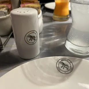 The beautiful monogrammed table settings.