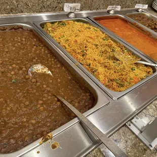 Channa Masala, Biryani, Butter Chicken Meal, a goat dish