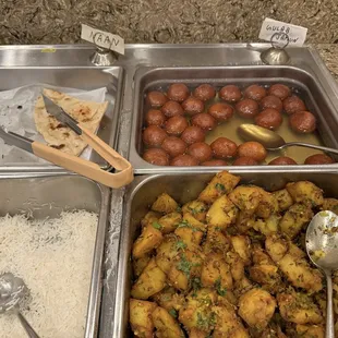 Plain Naan, Rice Tray, Gulab Jamun, seasoned potatoes