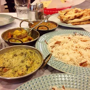 We got the vegetarian dinner for two: vegetable samosas, papadam, saag paneer, aloo gobi, dal, naan and rice pudding.