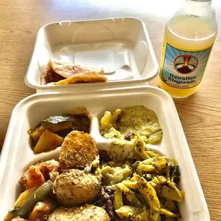 a meal in a styrofoam container