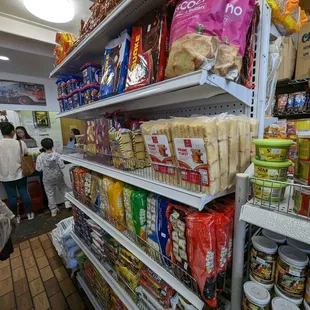 people shopping in a grocery store