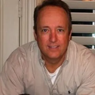John E.