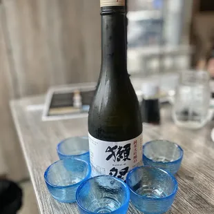 $65 large bottle of Sake.