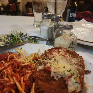 a plate of spaghetti and meat