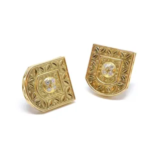 Earrings as fine  as a woven tapestry, but formed by hand in precious gold and diamonds