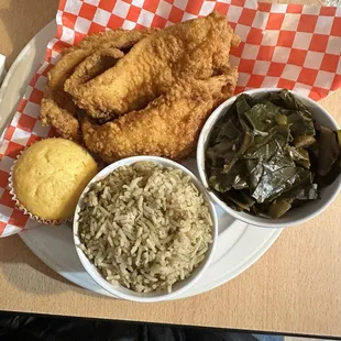 Cornbread, fried catfish, greens and dirty rice.