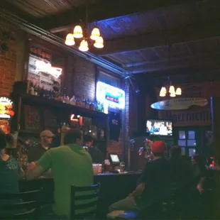 people sitting at a bar