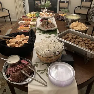 Beef tenderloin served with dollar rolls and a horseradish sour cream sauce.