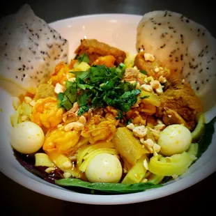 Mi Quang ( shrimp, quail egg, baby rib, pork belly, ground pork/shrimp, peanut, dry shallot, rice cracker ) MUST TRY DISH!!