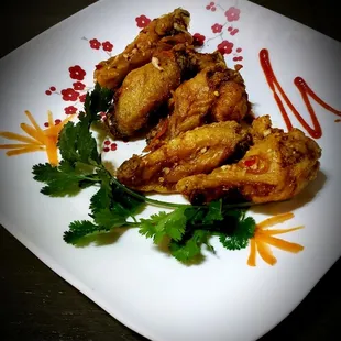 Uncle Tin's wings  Choice ( fish sauce or tangy lemongrass ponzu )