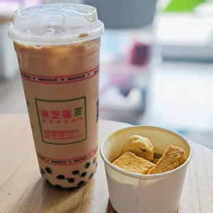 Silk stocking milk tea with boba and small curry combo.